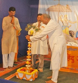 From Left : Mr. Rajendraprasad Bhogale, Dr. Uday Dhuri and Mr. Durgesh Parulkar while lighting the H